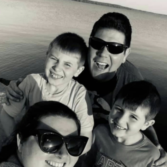 The Weber Family posed in front of Lake Erie.